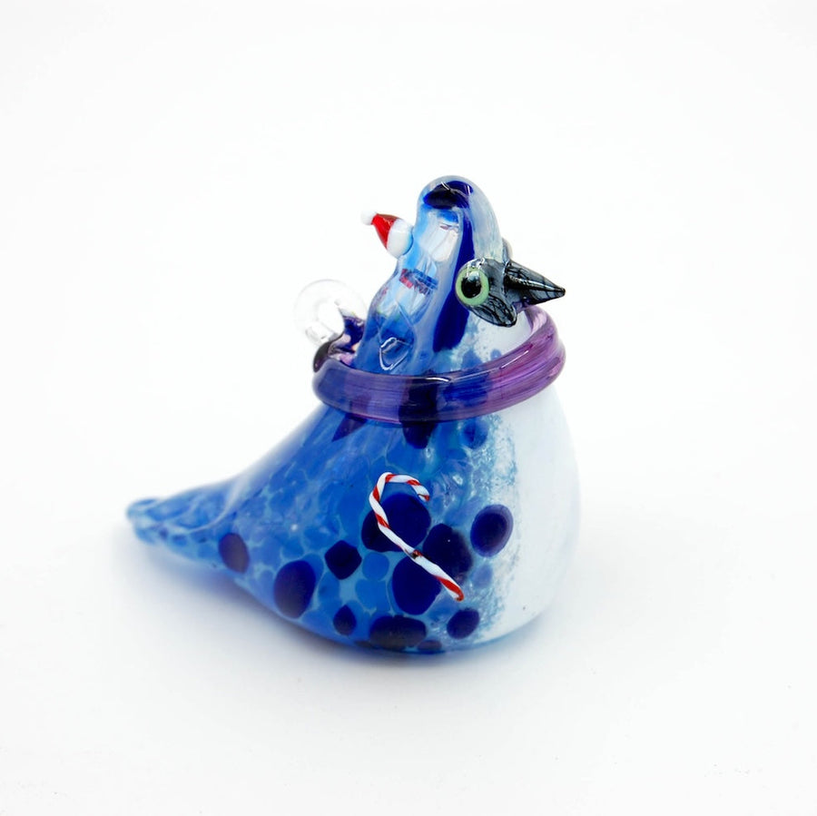 blown glass blue jay holiday arrangement on a white background