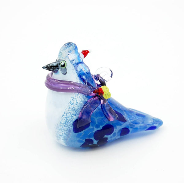 blown glass blue jay holiday arrangement on a white background