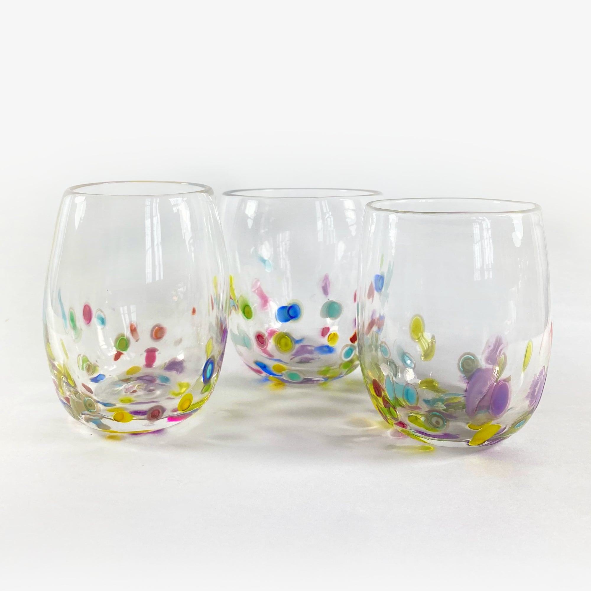 HAND BLOWN COLORED STEMLESS WINE GLASS
